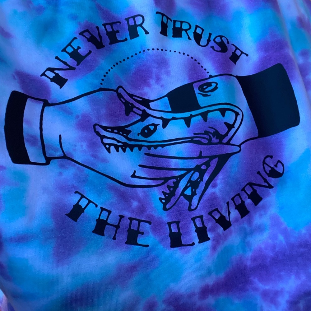 Never trust the living beetlejuice purple and green tye dye sweater